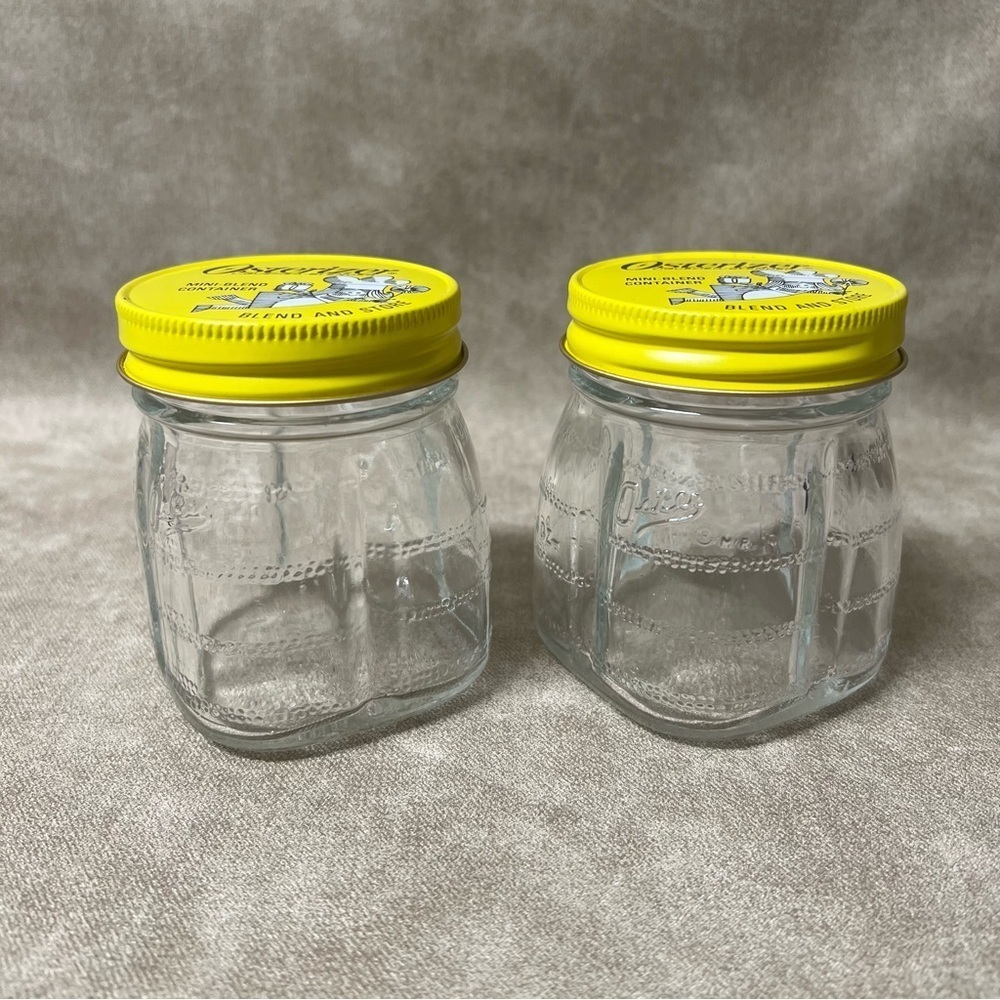 Set of (2) Osterizer Blend and Store Mini-Blend Containers Jars 8 oz
